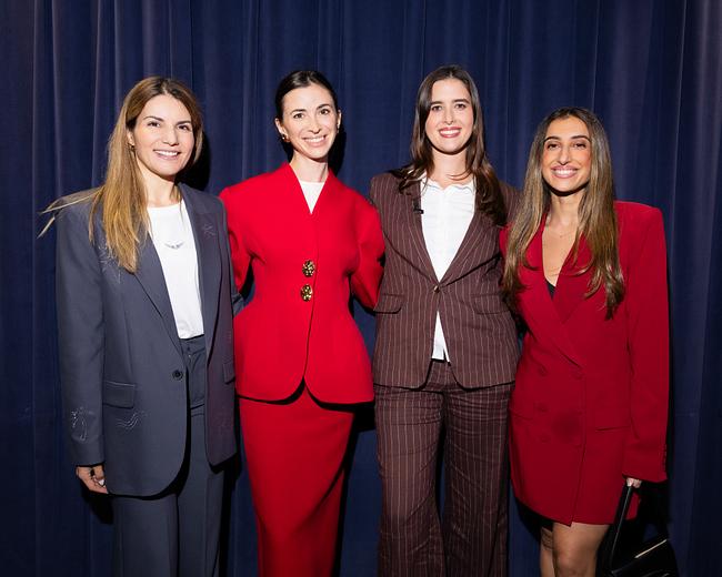 Valerie Chapman smiling with Joana Carrasqueira, Marina Mogilko and Avni Barman at the Ruth AI and Google hackathon